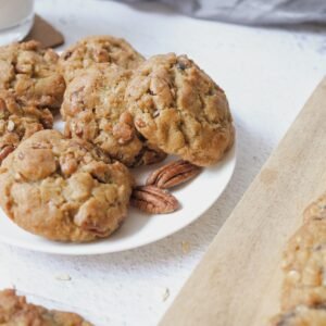 Delicious homemade pecan cookies served with milk, perfect for a cozy breakfast or snack.